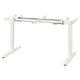 A BEKANT white height-adjustable desk.