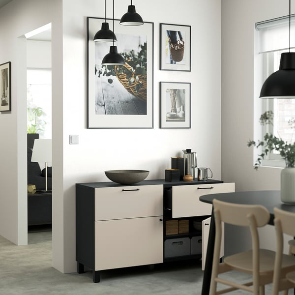 Modern dining room with BESTÅ sideboard and minimalist decor.