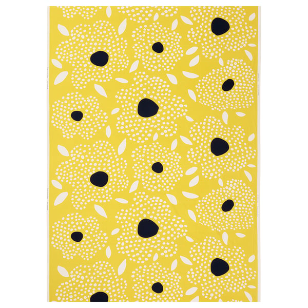 Bright yellow fabric with white and black polka dots and floral shapes, rectangular.
