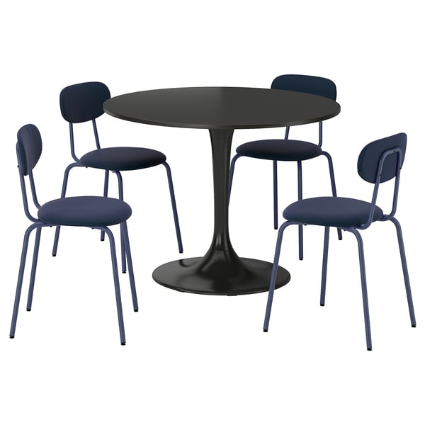 A DOCKSTA black round dining table with four blue upholstered chairs. Modern, sleek design with metal frames.