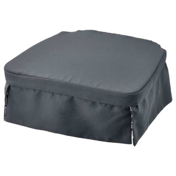 Dark grey chair pad, rectangular with skirted design. Solid colour, reversible for floral pattern.
