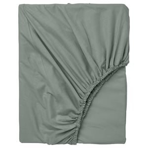 A DVALA grey-green fitted sheet made from 100% cotton, featuring elastic edges, displayed on a white background.