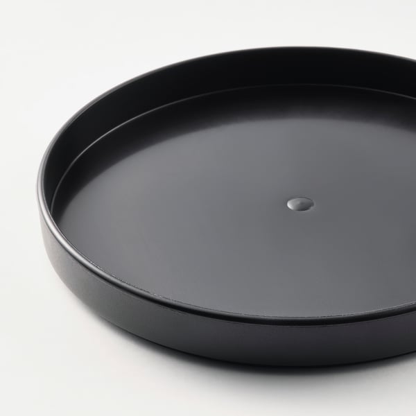 Black plastic kitchen tray with high edge, designed to collect water.