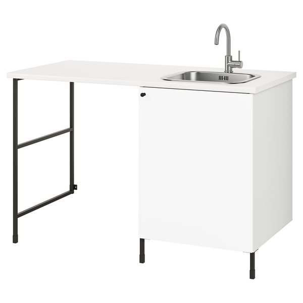 A white ENHET kitchen unit with a stainless steel sink and tap, black metal legs, and a black metal frame.