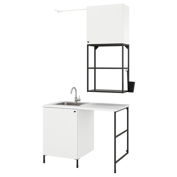 White ENHET laundry setup: sink, cabinet, shelves, modern design.