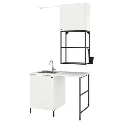 White ENHET laundry setup: sink, cabinet, shelves, modern design.
