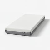 FÄGERÅSEN: white mattress, rectangular, with grey trim and foam top.
