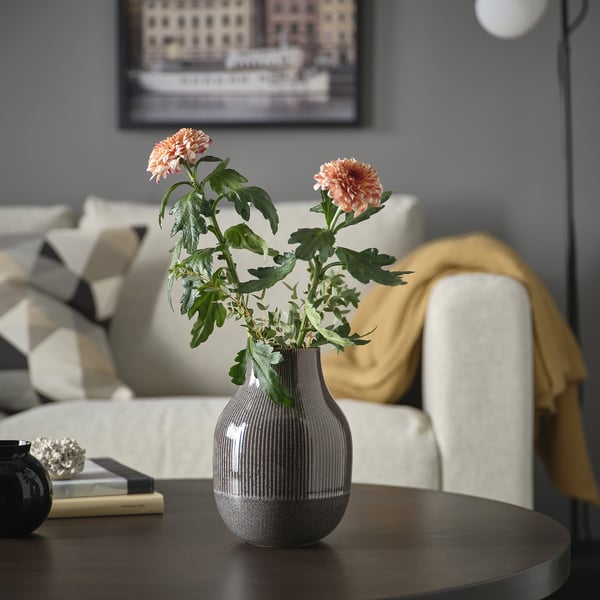 GRADVIS vase with pink flowers, bowl, books & couch.