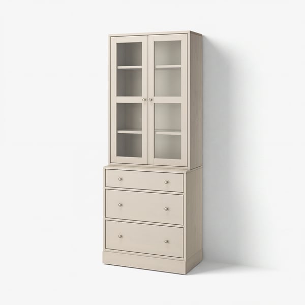 A HAVSTA light beige wooden cabinet with glass doors and drawers. It has a rustic, simple scandinavian design.