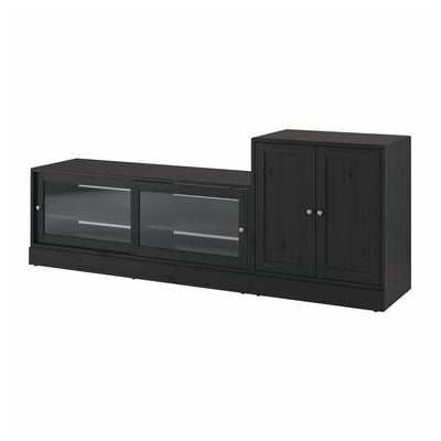 A black HAVSTA furniture set in pine wood with glass doors, combining rustic and modern design.