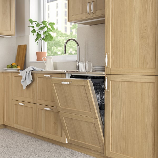 Modern kitchen with KALLBODA dishwasher, integrated wood design, double doors open, and functional countertop.