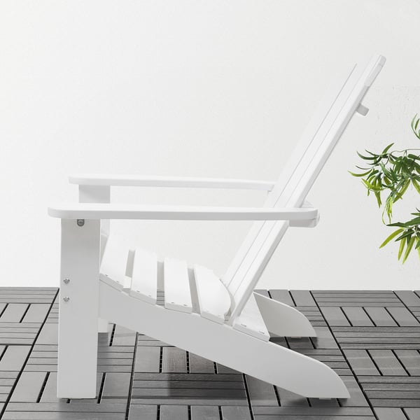 KLÖVEN adirondack chair in eucalyptus wood, perfect for outdoor relaxation on porches, patios, or poolside.
