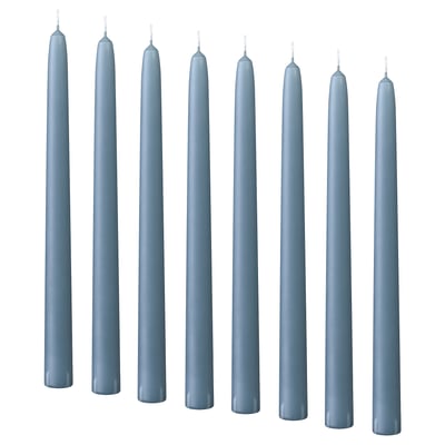 Eight blue KLOKHET candles, all tapered and unlit, arranged in two rows of four. Made of stearin, they stand upright in a neat line.