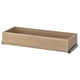 An empty wooden drawer from the KOMPLEMENT series, ideal for organising clothes and accessories, with a sleek natural finish.
