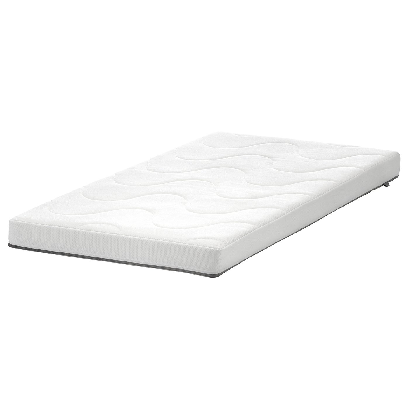 A white, rectangular KRUMMELUR cot mattress by IKEA, featuring a wavy side for medium-firm comfort and a smooth side for firmer support.