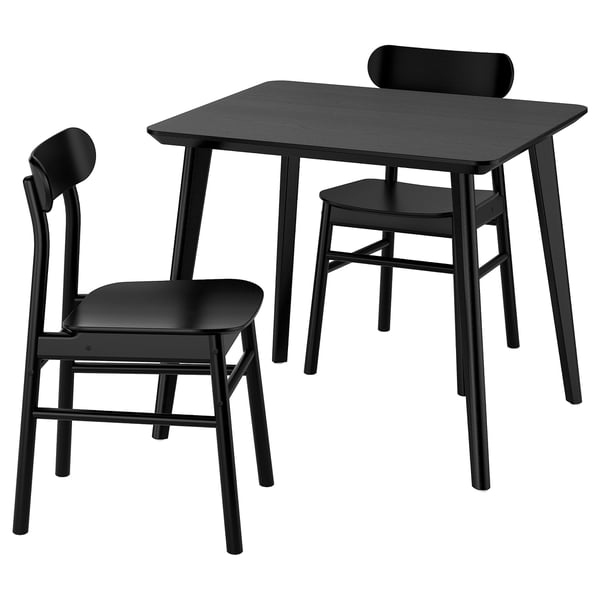 A black LISABO dining set with a rectangular table and two matching chairs. Its modern, compact, and made from wood.