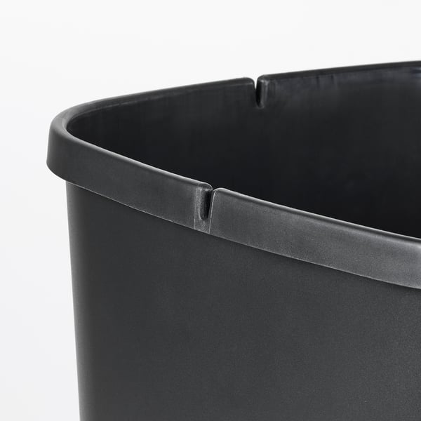 Image shows a high-quality, sleek black bin with secure lid design, suitable for waste sorting.