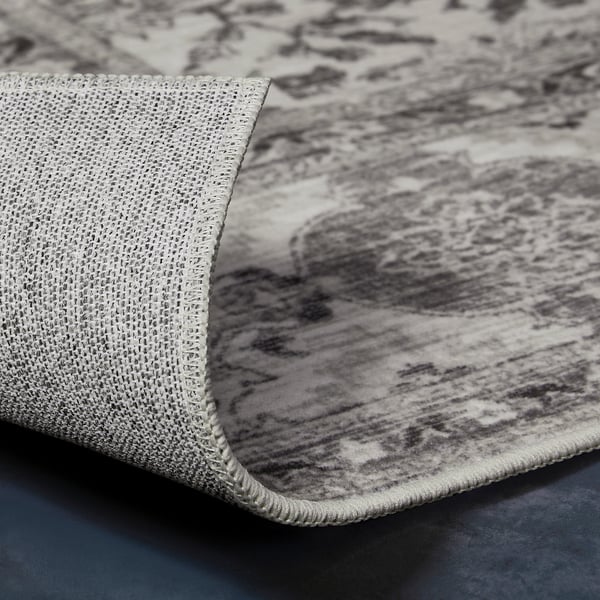 Close-up of fabric surface, showing texture and stitching of a high-quality, recycled material.