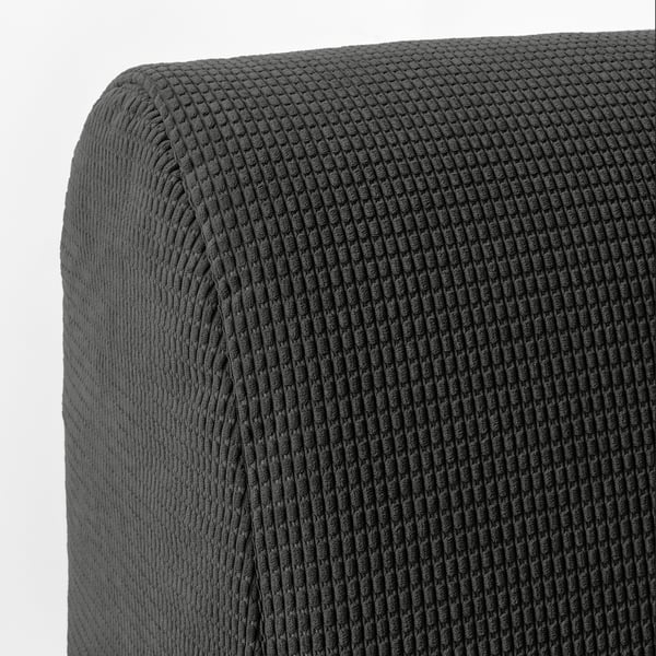 Dark grey, textured fabric close-up. Soft, thickweave, ribbed pattern, cosy sofa cover.