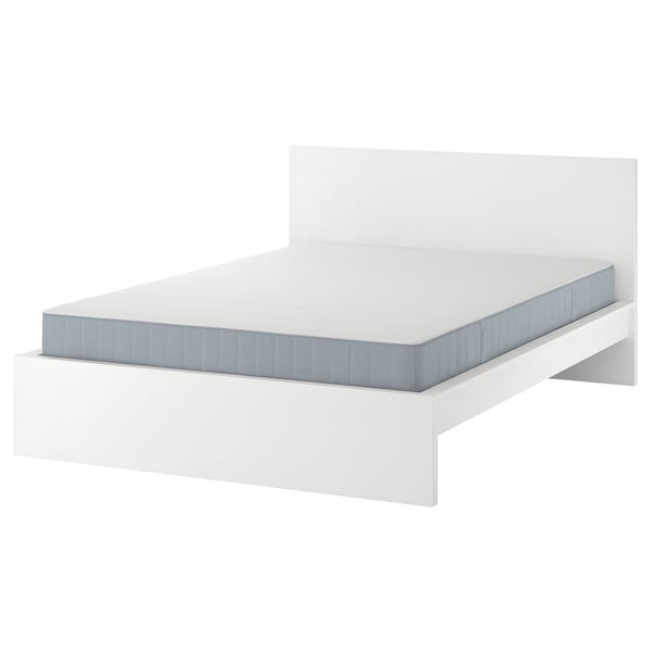 Minimalist white bed frame with simple design, sleek lines, and high headboard.