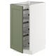 Modern green kitchen cabinet with pull-out racks.