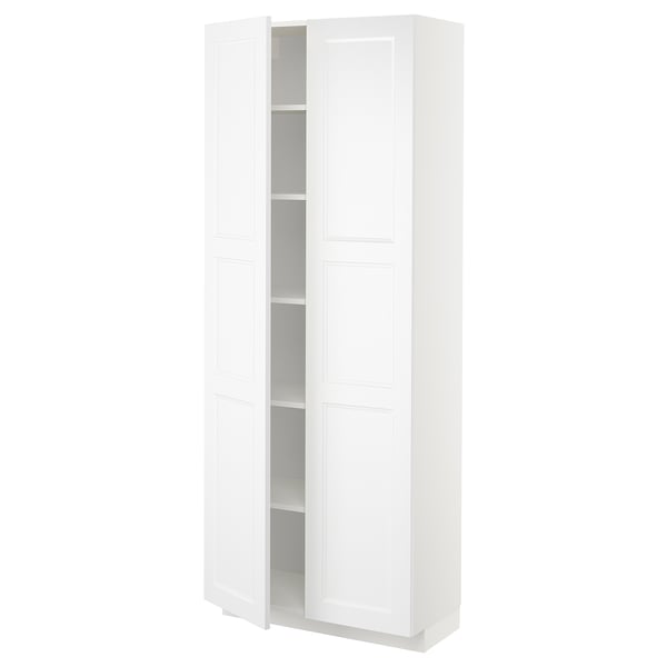 Depicts a white METOD kitchen cabinet with a sleek design featuring four shelves, suitable for various storage needs.
