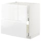 A white METOD kitchen cabinet with sleek, modern design and integrated handles. It a drawer and shelf for storage.