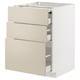 A white METOD kitchen cabinet with beige drawers. It three self-closing drawers and a pull-out work surface. The frame is sturdy and modern.