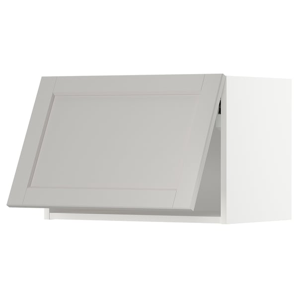 Modern kitchen cabinet in light grey with beveled edges.