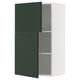 Modern kitchen cabinet with dark green doors and white frame.