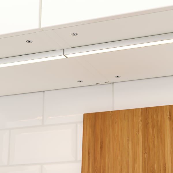 Modern kitchen ceiling, featuring integrated, energy-efficient led strips for even worktop lighting.