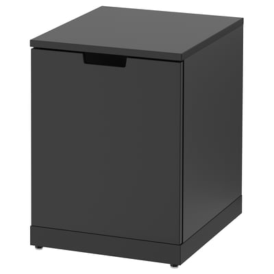 A black NORDLI chest of drawers with a sleek, modern design and clean lines. It is a single, rectangular drawer with a smooth finish.