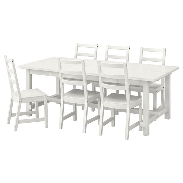 White wooden NORDVIKEN dining set with extendable table and six chairs, rustic design.