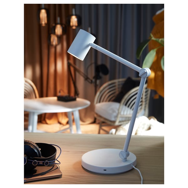Light blue NYMÅNE desk lamp with usb & wireless charging.