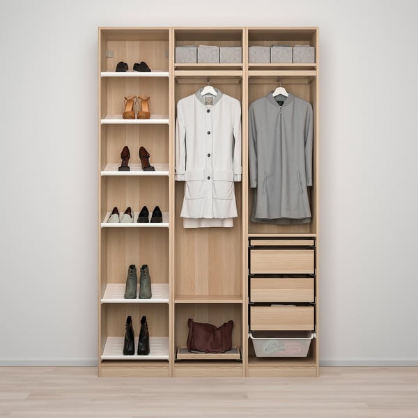 A wooden wardrobe with shelves displaying shoes, hanging clothes, and drawers, showcasing organised storage options.