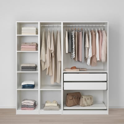 Closet with 2 rods, shelves, foldables, & drawers. Simple, organised storage.