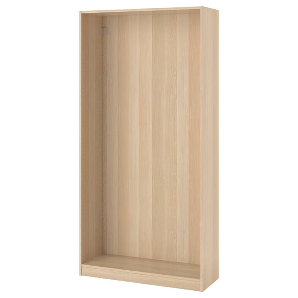 An ikea PAX wardrobe frame in white stain. Its made of recycled materials and is designed to be narrow, perfect for space-limited areas.