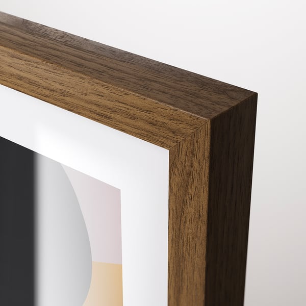 Close-up of rodalm frames polished wooden corner. Modern design, protective plastic front.