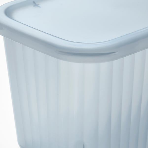 Clear, ribbed plastic box with lid, designed for organising small items, made from recycled material.