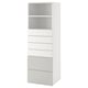A white SMÅSTAD storage unit with an open shelf at the top and five drawers below, ideal for organising various items.