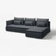 Modern dark grey sectional sofa with cushions, sleek design, l-shape.
