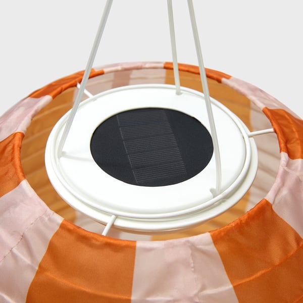 Solar-powered hanging lamp with striped orange and white shade, centred solar panel, and sturdy support frame.