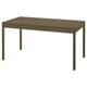 Rectangular oak dining table with four legs and smooth edges.