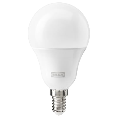 A white smart led bulb by IKEA, shaped like a classic lightbulb with a smooth, rounded cover made of polycarbonate plastic.