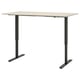Trotton adjustable standing desk, beige top, black metal legs, rectangular shape.