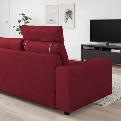 Red VIMLE sofa in living room with tv. Modern, comfy design. Large compared to tv & plant.