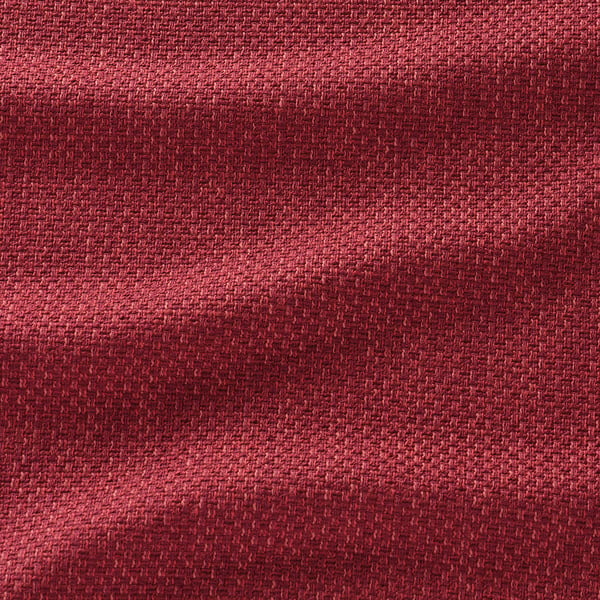 Vibrant red woven fabric with textured detailing; rich, inviting texture.