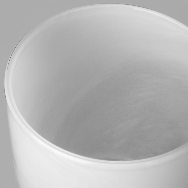 Cylindrical white glass vase, smooth finish. Craftsmanship with even, flawless surface.