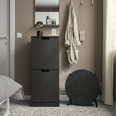 VINDSTYRKA air sensor on cabinet, monitors air quality, temperature, humidity, pollutants, connects to smart home.