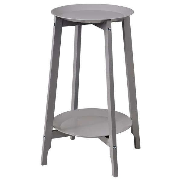 Ett grått ALPVIDE växtställ med en rund stålbricka och träben i minimalistisk design.
